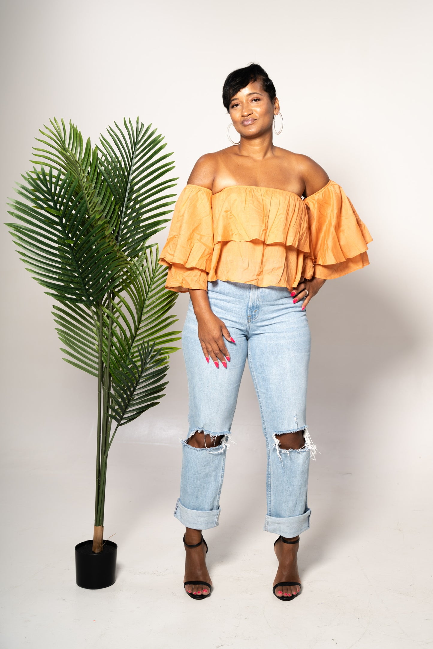 off shoulder blouse orange color front view