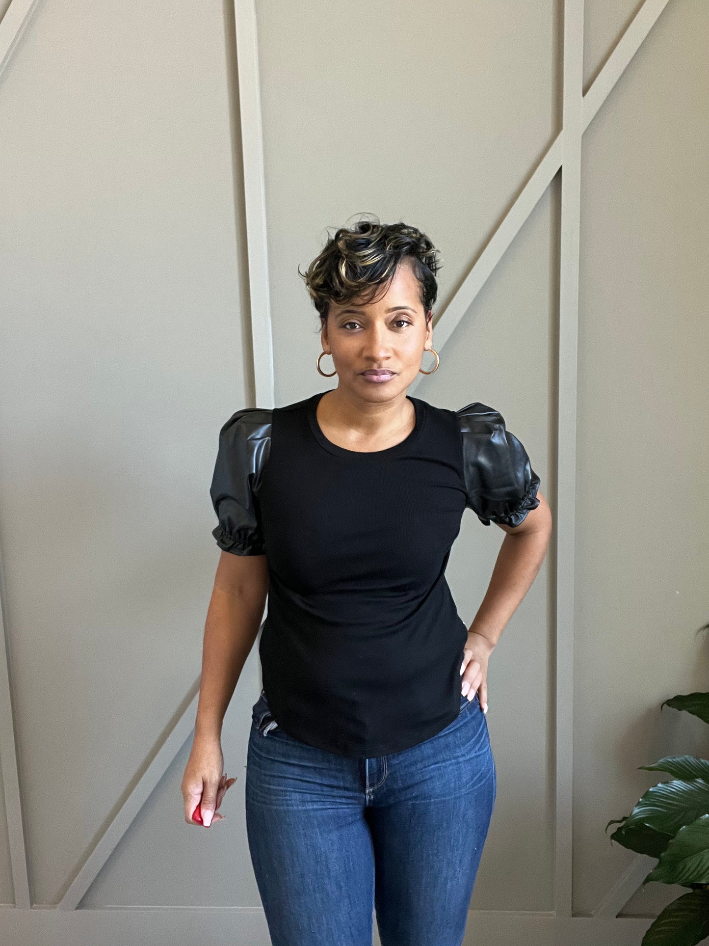 leather sleeve top close up view